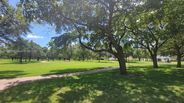 7640 NW 6th Ct, Plantation, FL 33324 - view of home's community with a lawn