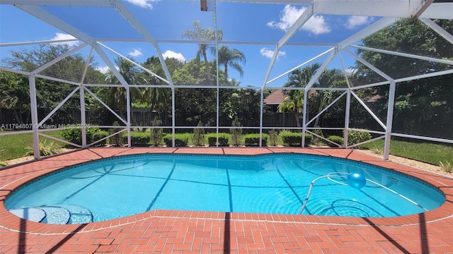 7640 NW 6th Ct, Plantation, FL 33324 - view of pool with a lanai