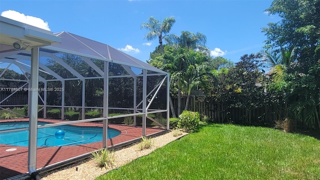 7640 NW 6th Ct, Plantation, FL 33324 - view of pool with a fenced backyard and a lanai