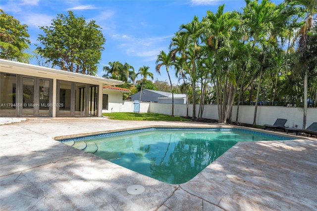 549 NE 12th Ave, Fort Lauderdale, FL 33301 - view of pool with a patio, a fenced backyard, french doors, and a fenced in pool