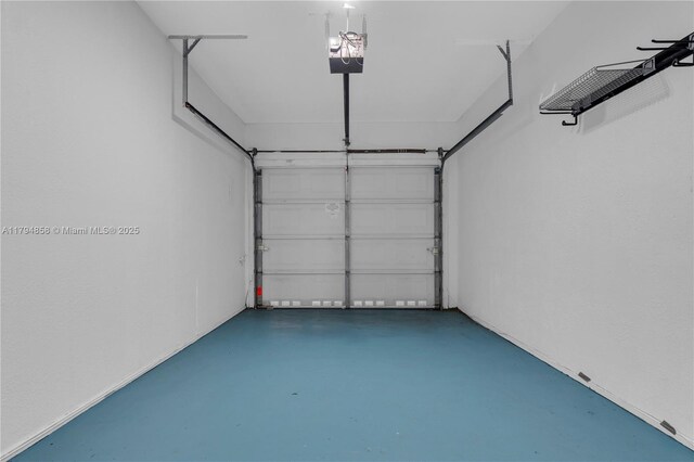 549 NE 12th Ave, Fort Lauderdale, FL 33301 - garage featuring a garage door opener