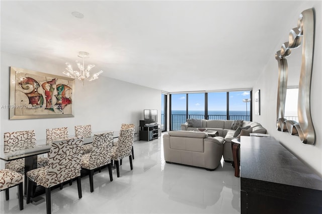 living area with floor to ceiling windows and a notable chandelier