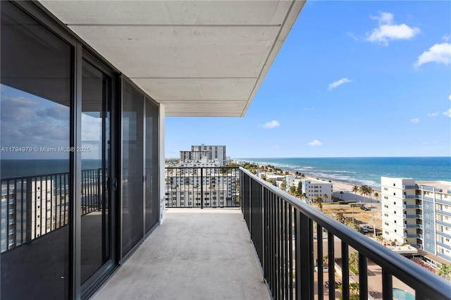 balcony with a city view and a water view