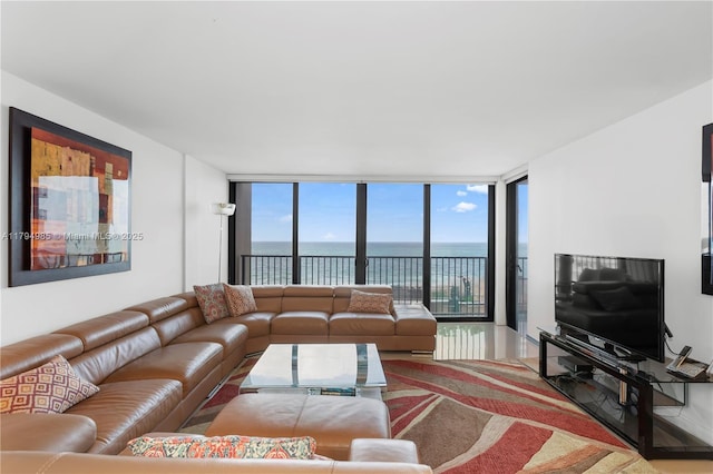 living area featuring floor to ceiling windows