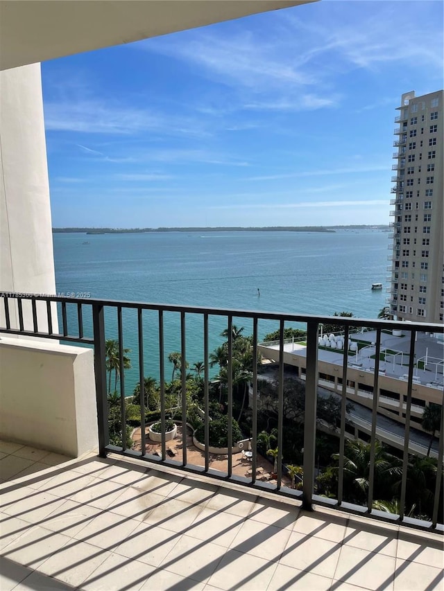 balcony featuring a water view
