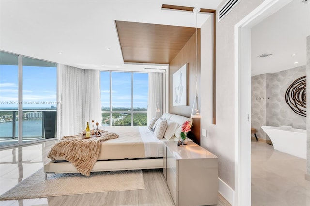 17111 Biscayne Blvd Unit 2208, Aventura, FL 33160 - bedroom with visible vents, access to exterior, and a wall of windows