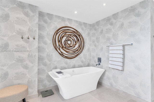 17111 Biscayne Blvd Unit 2208, Aventura, FL 33160 - bathroom featuring a freestanding tub, wallpapered walls, and recessed lighting