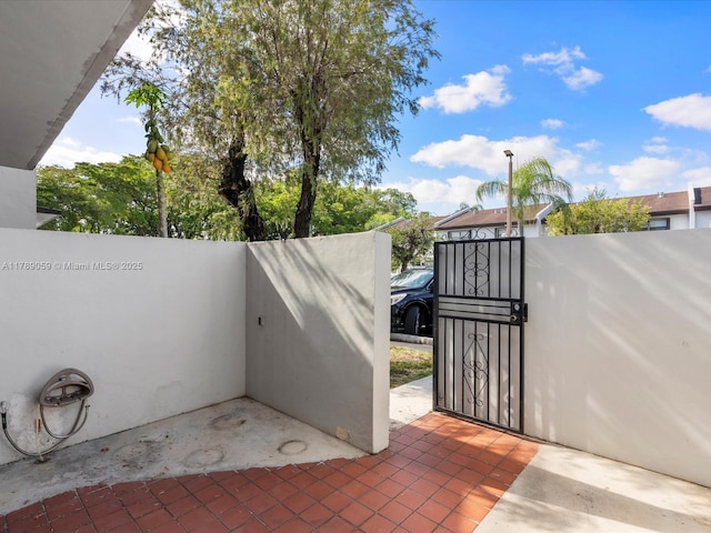 8000 SW 152nd Ave Unit 111, Miami, FL 33193 - view of patio / terrace with fence and a gate