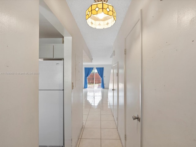 8000 SW 152nd Ave Unit 111, Miami, FL 33193 - corridor featuring light tile patterned floors