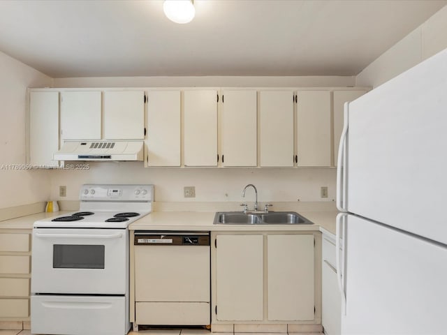 8000 SW 152nd Ave Unit 111, Miami, FL 33193 - kitchen with white appliances, under cabinet range hood, a sink, and light countertops