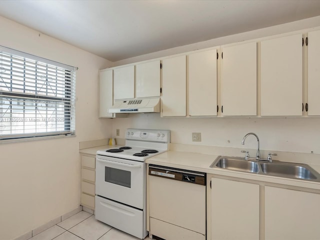 8000 SW 152nd Ave Unit 111, Miami, FL 33193 - kitchen featuring white appliances, light countertops, under cabinet range hood, a sink, and light tile patterned floors