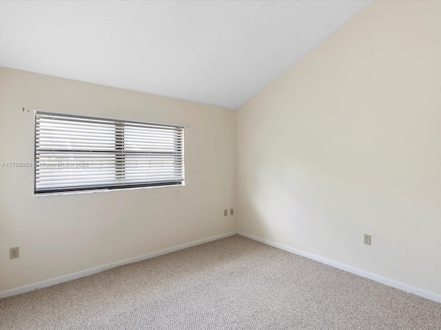 8000 SW 152nd Ave Unit 111, Miami, FL 33193 - carpeted spare room with baseboards and lofted ceiling