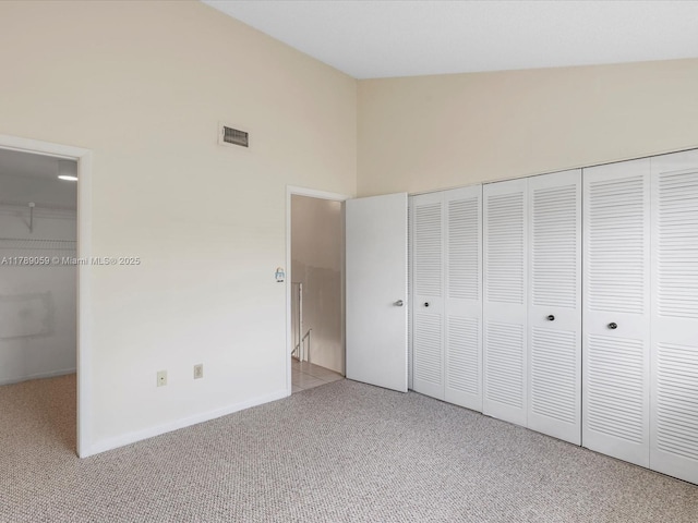 8000 SW 152nd Ave Unit 111, Miami, FL 33193 - unfurnished bedroom featuring light colored carpet, baseboards, visible vents, and a closet