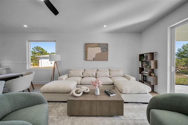 living area featuring recessed lighting, a healthy amount of sunlight, and light wood finished floors