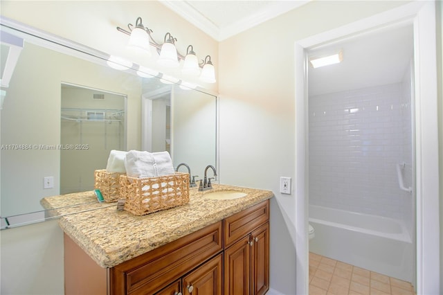 bathroom with tile patterned flooring, vanity, toilet, visible vents, and ornamental molding