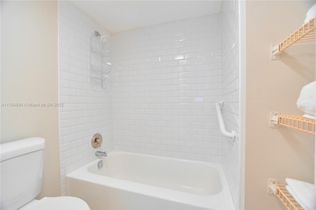 bathroom with toilet and shower / washtub combination