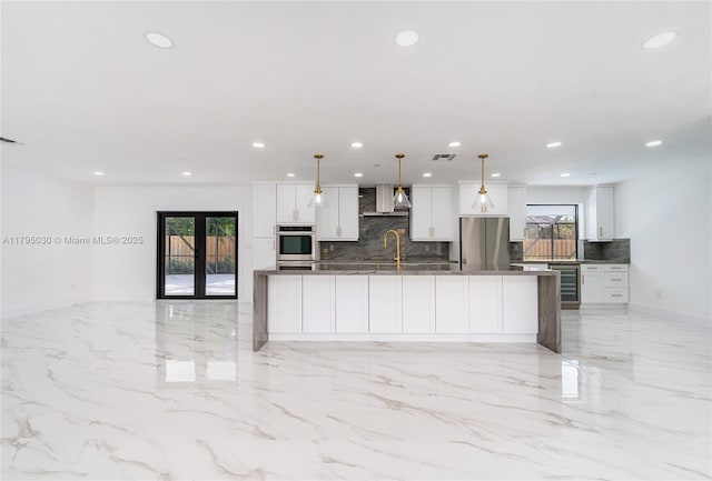 kitchen featuring wall chimney range hood, appliances with stainless steel finishes, recessed lighting, decorative backsplash, and wine cooler