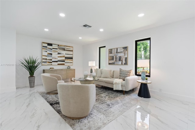 living room featuring baseboards, marble finish floor, recessed lighting, and visible vents