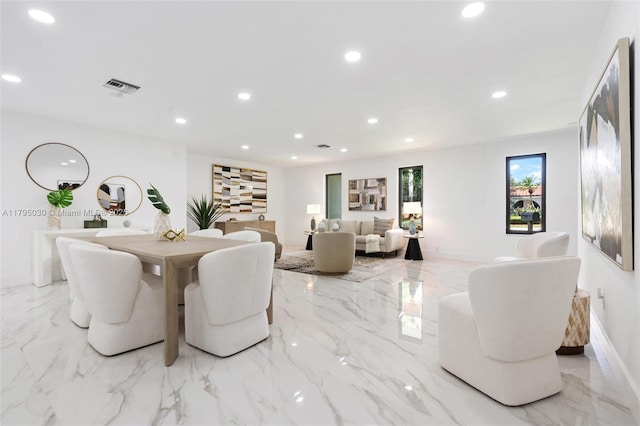 dining room with recessed lighting, baseboards, visible vents, and marble finish floor