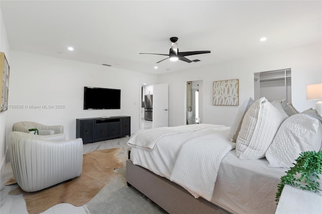 bedroom with recessed lighting, a ceiling fan, a spacious closet, and visible vents