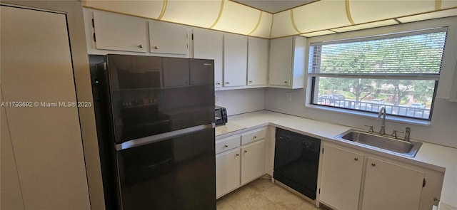 10207 Sunrise Lakes Blvd Unit 307, Sunrise, FL 33322 - kitchen featuring refrigerator, black dishwasher, light countertops, and light tile patterned floors
