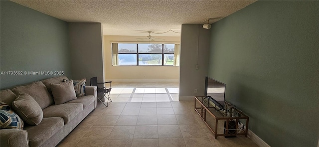 10207 Sunrise Lakes Blvd Unit 307, Sunrise, FL 33322 - living area featuring a textured ceiling, a ceiling fan, and tile patterned flooring