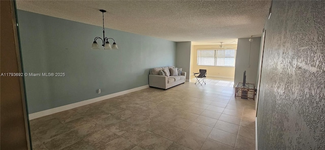 10207 Sunrise Lakes Blvd Unit 307, Sunrise, FL 33322 - living room with a chandelier and a textured ceiling