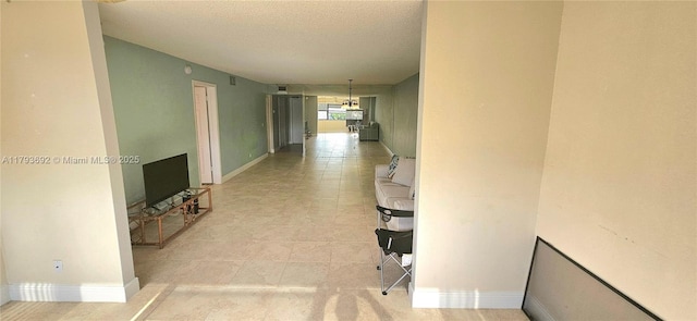10207 Sunrise Lakes Blvd Unit 307, Sunrise, FL 33322 - hall featuring a textured ceiling and light tile patterned floors