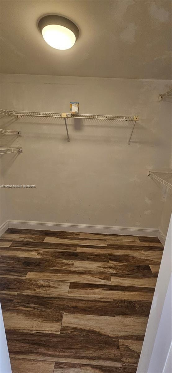 10207 Sunrise Lakes Blvd Unit 307, Sunrise, FL 33322 - spacious closet featuring wood finished floors