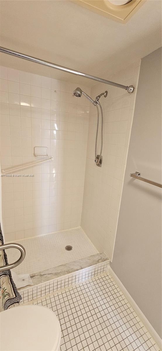 10207 Sunrise Lakes Blvd Unit 307, Sunrise, FL 33322 - full bathroom with a stall shower and tile patterned floors