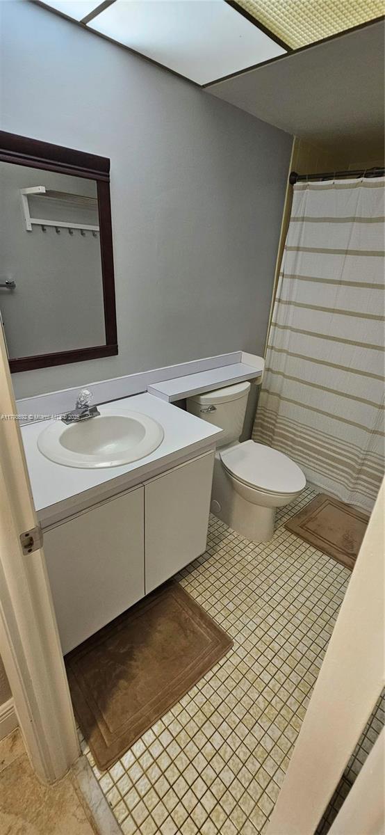 10207 Sunrise Lakes Blvd Unit 307, Sunrise, FL 33322 - bathroom featuring vanity and a shower with curtain