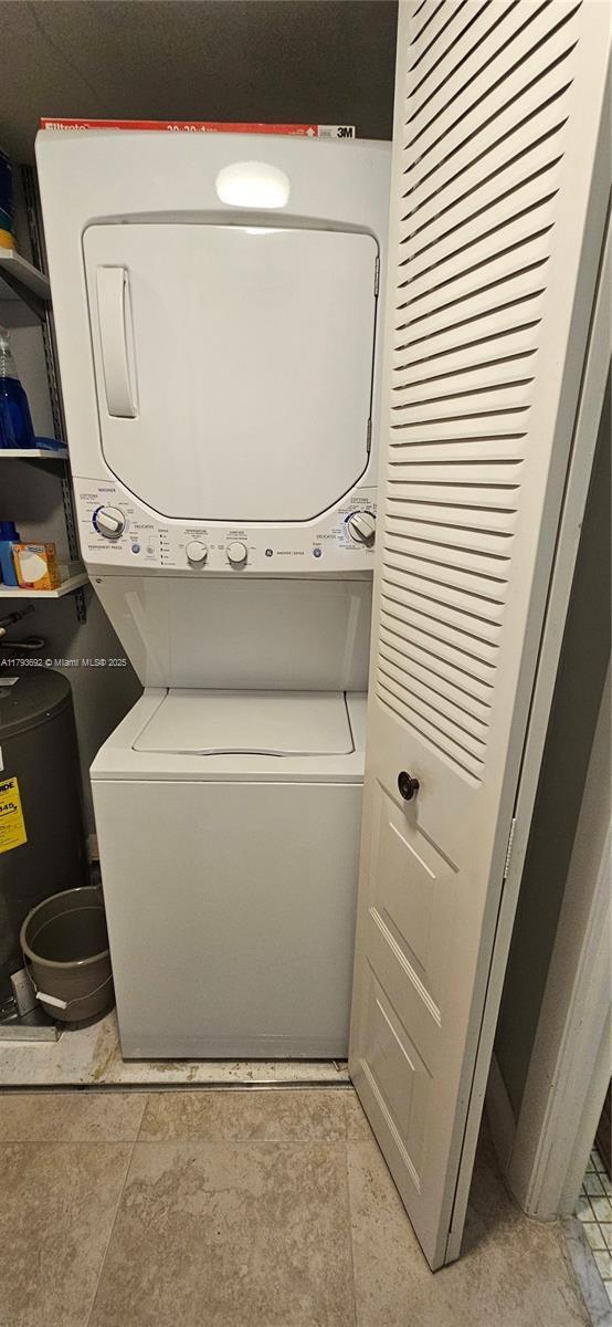 10207 Sunrise Lakes Blvd Unit 307, Sunrise, FL 33322 - laundry room with estacked washer and dryer