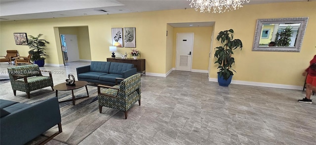 10207 Sunrise Lakes Blvd Unit 307, Sunrise, FL 33322 - living room featuring a chandelier and baseboards