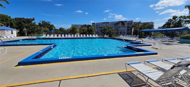 10207 Sunrise Lakes Blvd Unit 307, Sunrise, FL 33322 - community pool with a patio