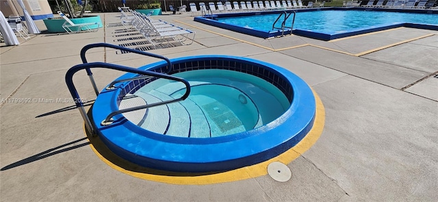 10207 Sunrise Lakes Blvd Unit 307, Sunrise, FL 33322 - community pool featuring a patio area