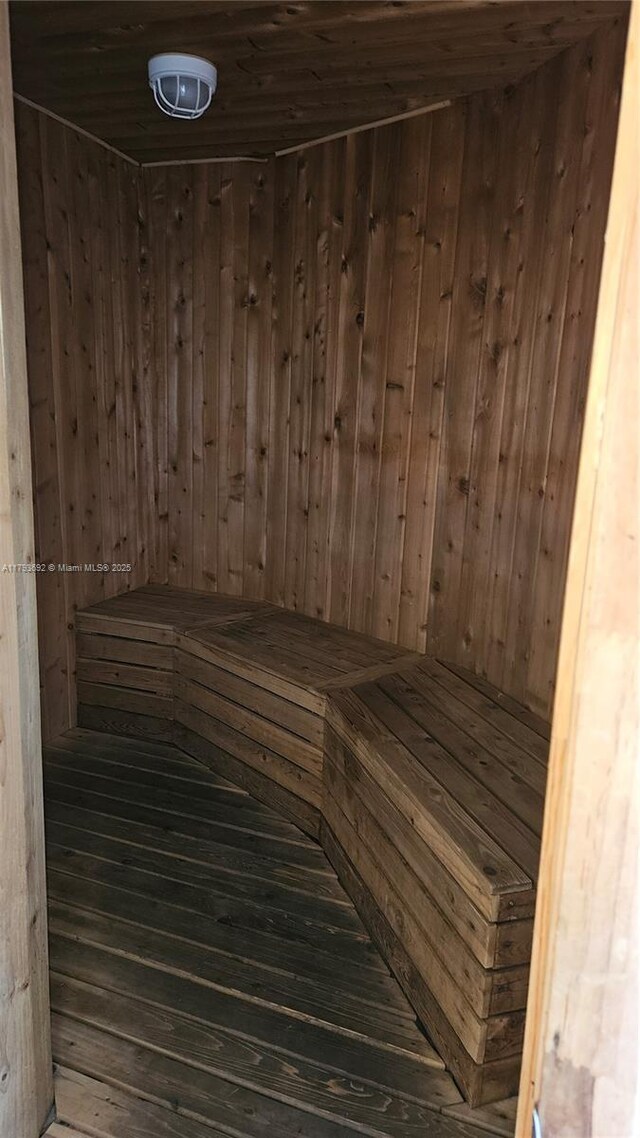 10207 Sunrise Lakes Blvd Unit 307, Sunrise, FL 33322 - sauna featuring wood walls, wood finished floors, and wood ceiling