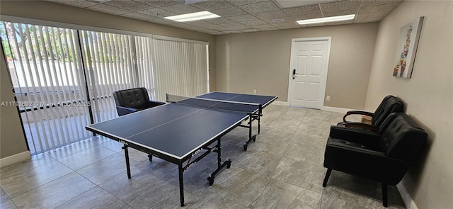 10207 Sunrise Lakes Blvd Unit 307, Sunrise, FL 33322 - playroom featuring a drop ceiling and light tile patterned floors