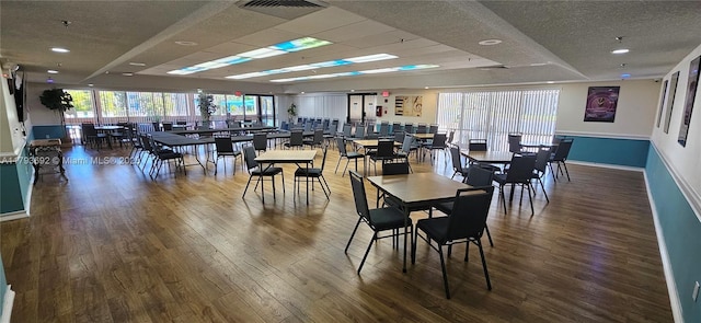 10207 Sunrise Lakes Blvd Unit 307, Sunrise, FL 33322 - dining space featuring wood finished floors and a textured ceiling