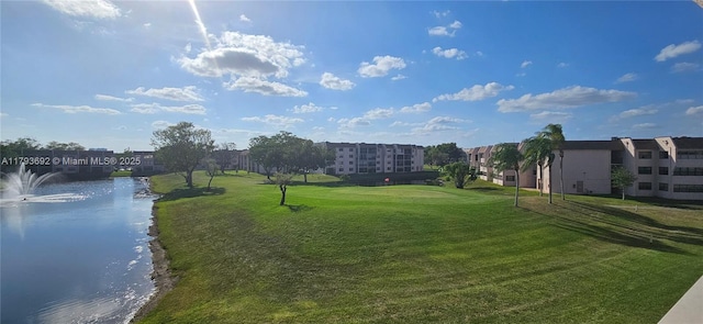 10207 Sunrise Lakes Blvd Unit 307, Sunrise, FL 33322 - surrounding community with a water view and a yard