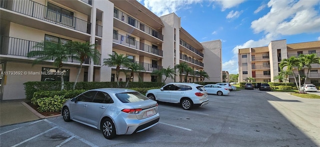 10207 Sunrise Lakes Blvd Unit 307, Sunrise, FL 33322 - view of apartment building / complex with uncovered parking
