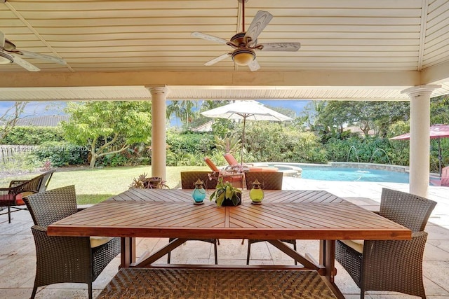 view of patio with a ceiling fan, an outdoor pool, an in ground hot tub, and outdoor dining space