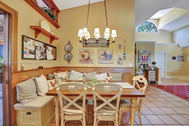 9682 Ridgecrest Ct, Davie, FL 33328 - dining room featuring a towering ceiling, a chandelier, and light tile patterned flooring