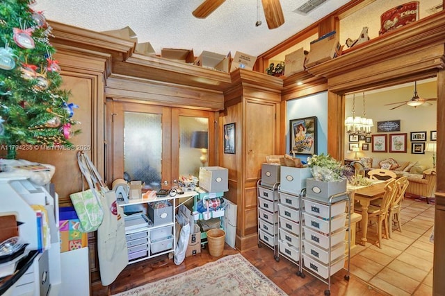 9682 Ridgecrest Ct, Davie, FL 33328 - misc room featuring a ceiling fan, ornamental molding, a chandelier, a textured ceiling, and vaulted ceiling