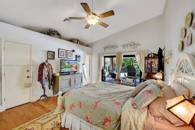 bedroom featuring ceiling fan, high vaulted ceiling, access to exterior, light wood-type flooring, and visible vents