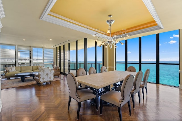 9999 Collins Ave Unit Ph3D, Bal Harbour, FL 33154 - dining area with a wall of windows, a raised ceiling, a chandelier, a water view, and recessed lighting