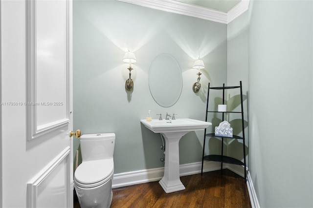 9999 Collins Ave Unit Ph3D, Bal Harbour, FL 33154 - half bathroom with crown molding, baseboards, toilet, and wood finished floors