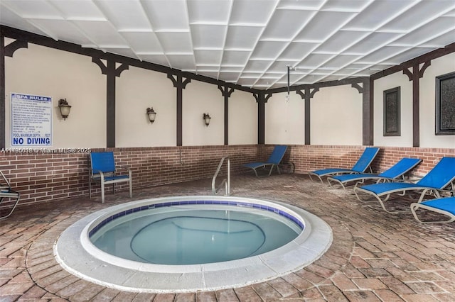view of pool featuring an indoor in ground hot tub