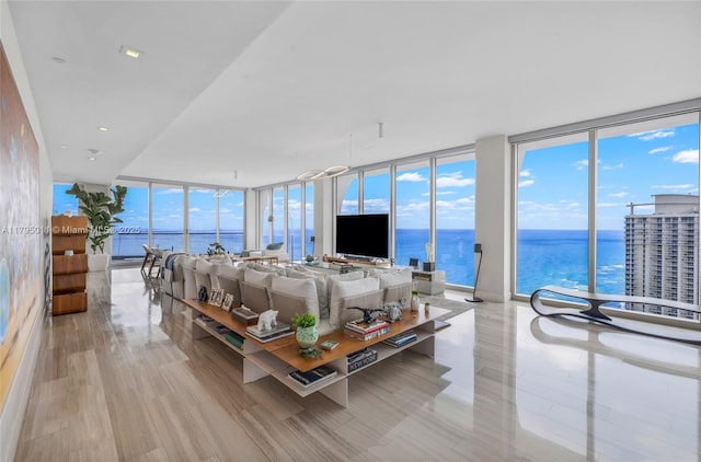 living area with a wall of windows