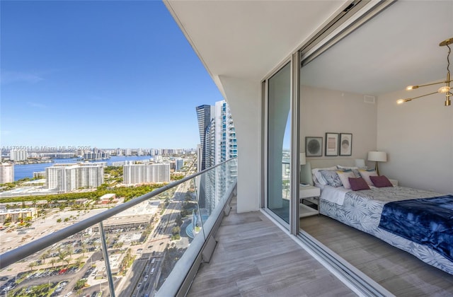 balcony with a ceiling fan and a city view