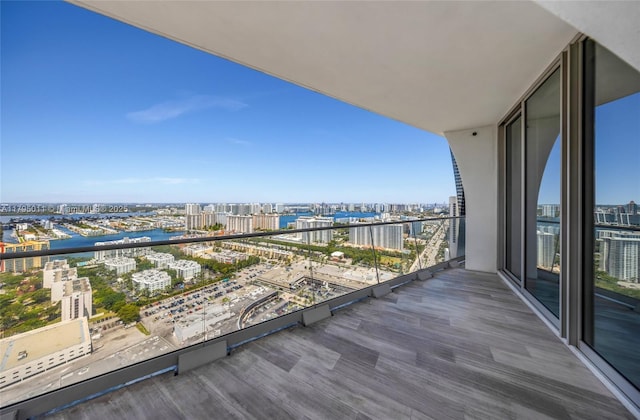 balcony with a city view and a water view